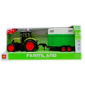    Un trattore a batteria con rimorchio per il trasporto dei cavalli