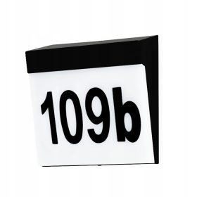    Lampada da facciata nera Kwazar Luminaire 9379 con numero civico