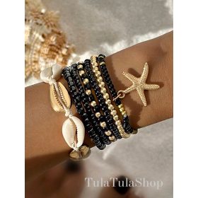    SET DI GIOIELLI CON CONCHIGLIA BRACCIALETTI IN ORO CON PERLE NERE